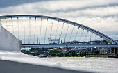 Bratislava castle behind modern Apollo bridge