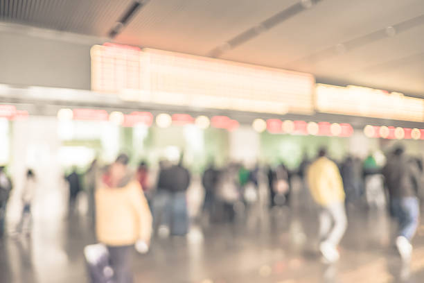 istock Blurred background : people queuing to buy a public transport 584767668