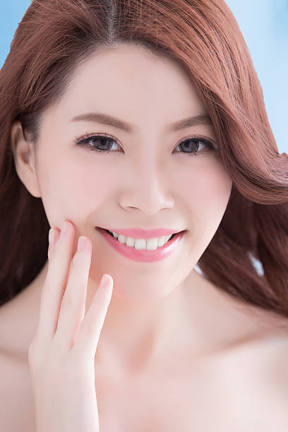 istock Beautiful woman with health teeth 584767962
