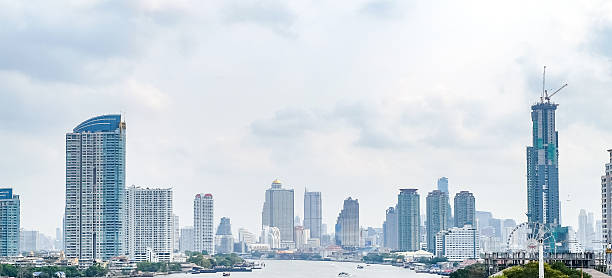 istock City building riverside view with cloudy sky,City scape view 584769686