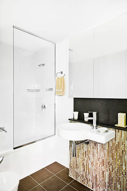 istock Modern bathroom with washbasin and a toilet 584770252