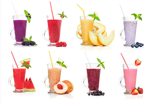 Different types of smoothies, isolated on white background closeup