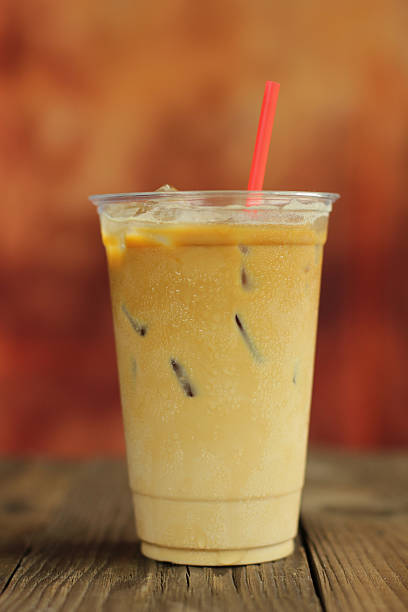 istock Iced coffee cafe latte on the wood 584771984