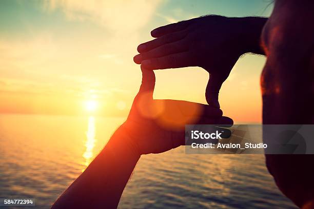 Composition Hand Frame Stock Photo - Download Image Now - Finger Frame, Sunset, Adult
