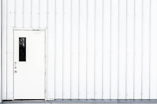 istock white door, industry door, exit safety door. 584774028
