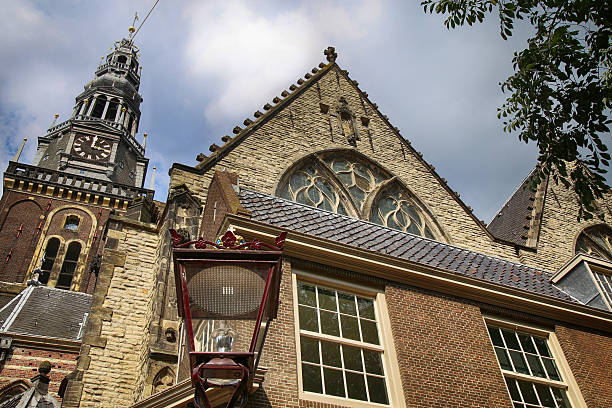 istock View of Oude Kerk (Old Church), Amsterdam, Netherlands 584774916
