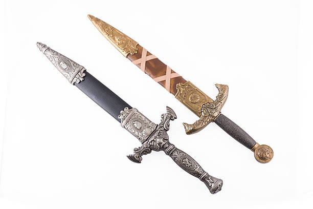 istock Roman military daggers on white background 584775024