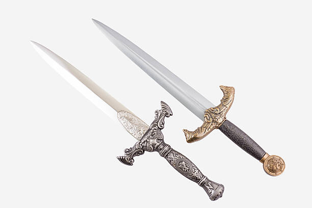 istock Roman military daggers on white background 584775100