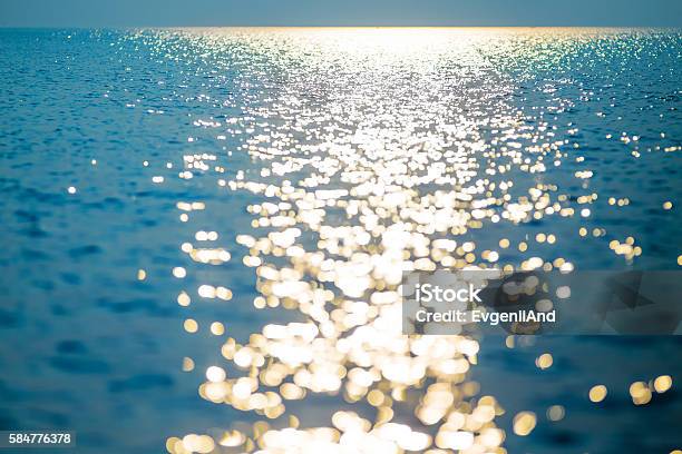 Water Horizon At Sunset Stock Photo - Download Image Now - Water, Sunlight, Shiny
