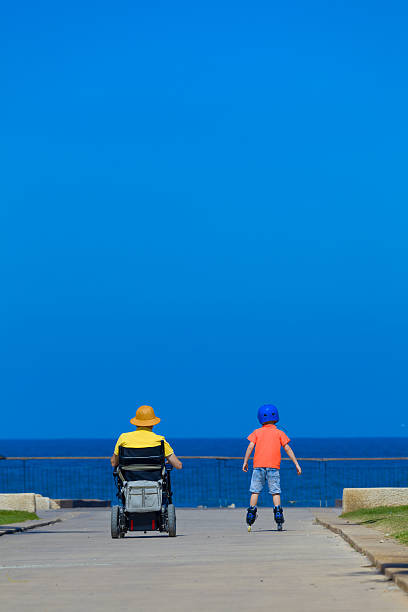 istock Disabled Father play with his little son 584779048