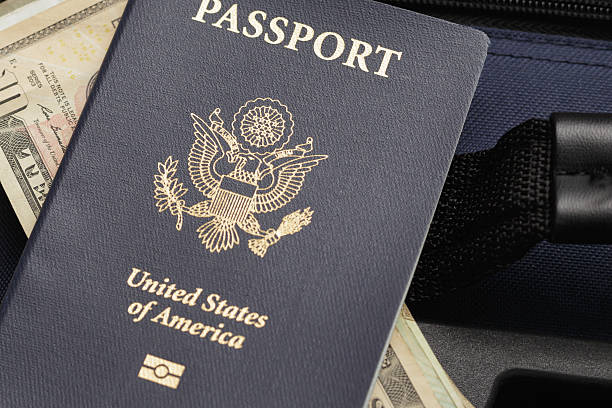 istock passport,money,and a suitcase 584780460