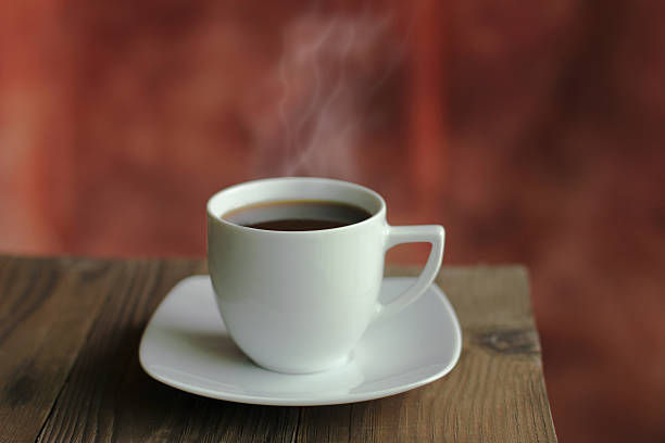 istock Hot coffee black coffee on the wood 584786416