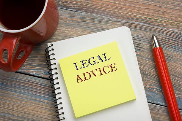 istock Legal Advice. Notepad with message, coffee cup and red pencil 584788068