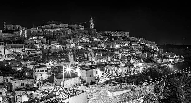 istock Panoramic nocturnal view of Matera, Italy 584789544