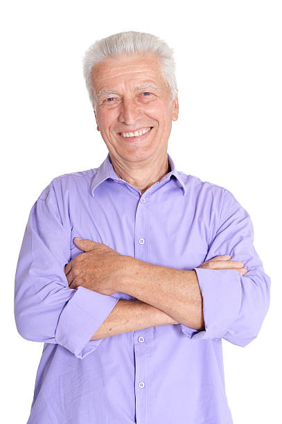 istock happy senior man in shirt 584789578