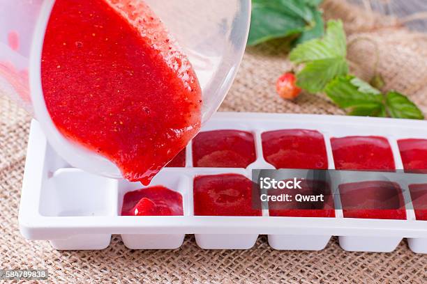 Frozen Cubes Of Berries Stock Photo - Download Image Now - Berry Fruit, Black Color, Block Shape