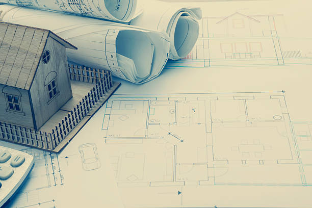 istock Real Estate concept. Architect workplace. Architectural project, blueprints, blueprint rolls 584848826