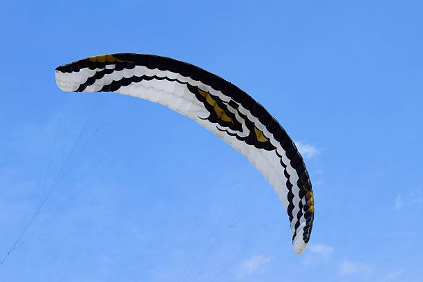 Kite surfing kite catching the wind Kite surfing kite catching the wind at Fort De Soto Park,Florida kiteboarding stock pictures, royalty-free photos & images