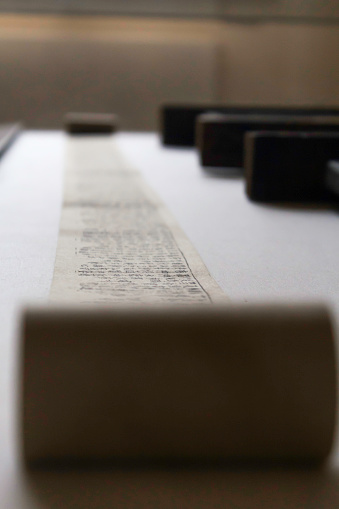 An ancient Chinese scroll unrolled.