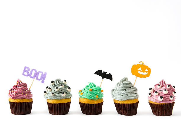Halloween cupcakes Halloween cupcakes isolated on white background halloween cupcake stock pictures, royalty-free photos & images
