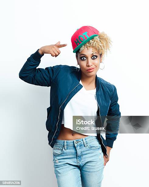 Portrait Of Afro American Young Woman With Pink Cap Stock Photo - Download Image Now