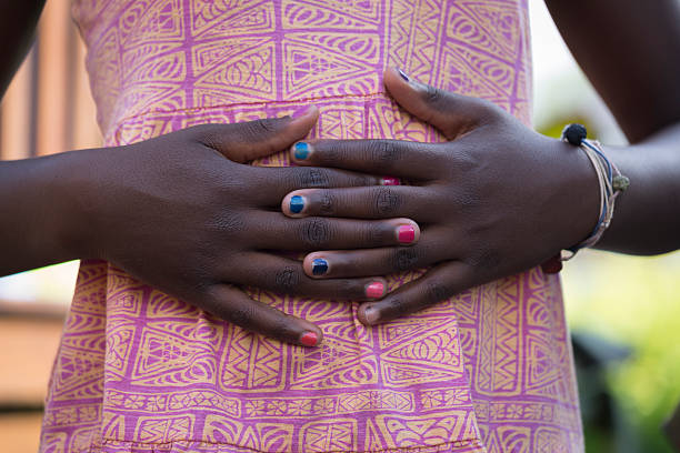 istock Black Girl Hand and Abdomen 584855456