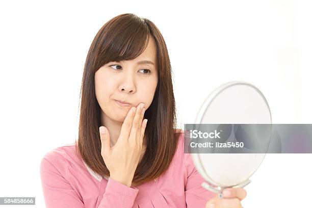 Disappointed Asian Woman Stock Photo - Download Image Now - Japanese Ethnicity, Wrinkled, 20-29 Years