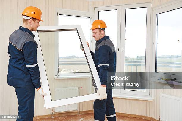 Windows Installation Workers Stock Photo - Download Image Now - Window, Installing, Carpenter