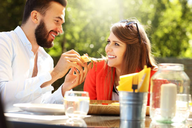 istock Young couple in restaurant 584861628