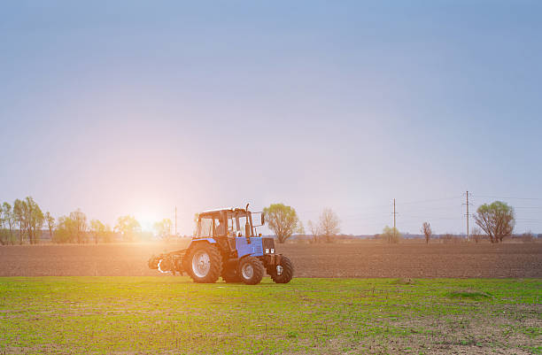 istock tractor going to plow the field 584865688