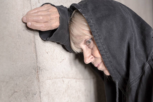 istock depress senior person with concrete background 584867296