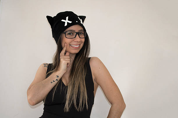 istock Woman with cat costume 584870172