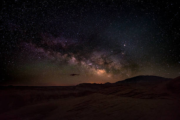 istock Milky Way rising behind Navajo Mountain 584870440