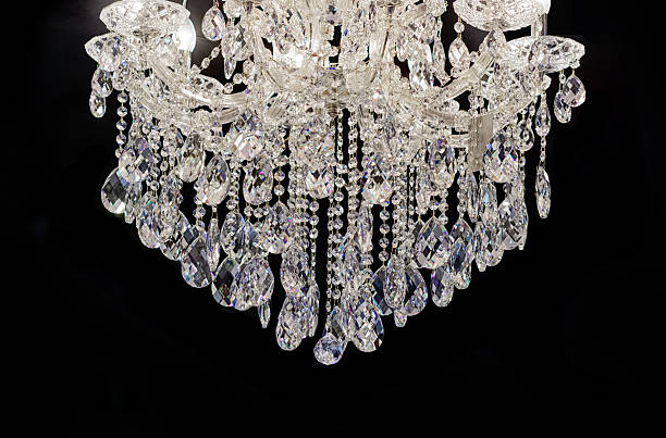 istock Chrystal chandelier close-up. black background with copy space 584870784