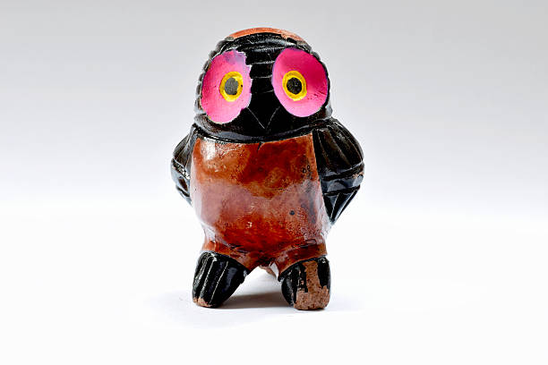 istock Little handmade statuette of an owl 584871432