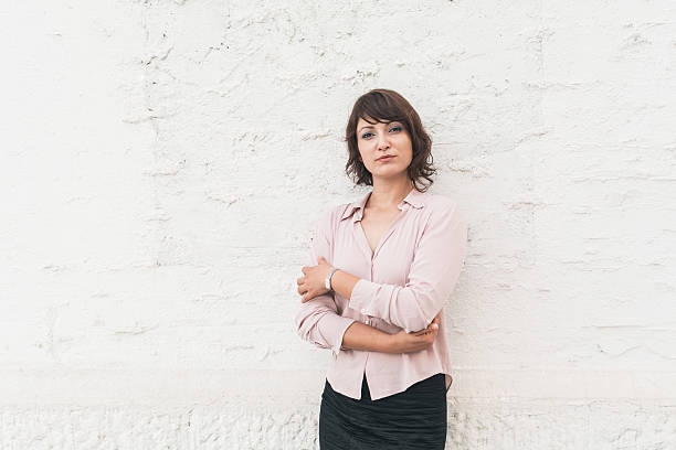 istock Young woman looking at camera 584874872