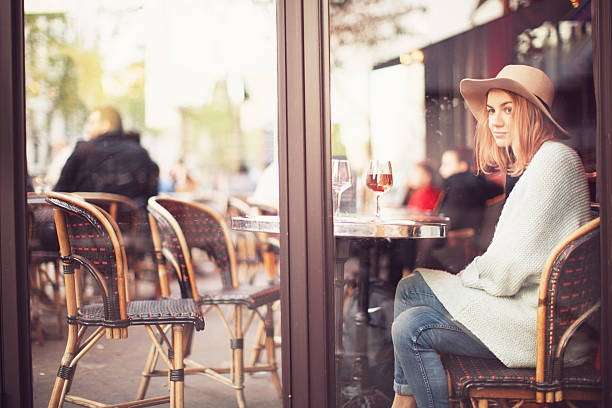 istock Young Woman in Cafe 584875508