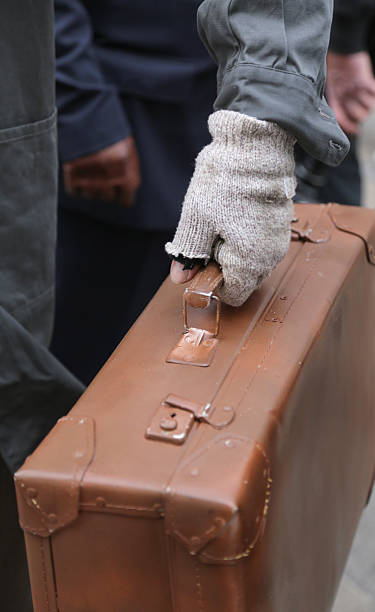 istock old leather suitcase and the broken glove 584875756