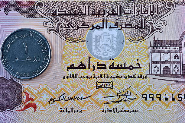 istock Close up Dirhams currency, United Arab Emirates 584876176