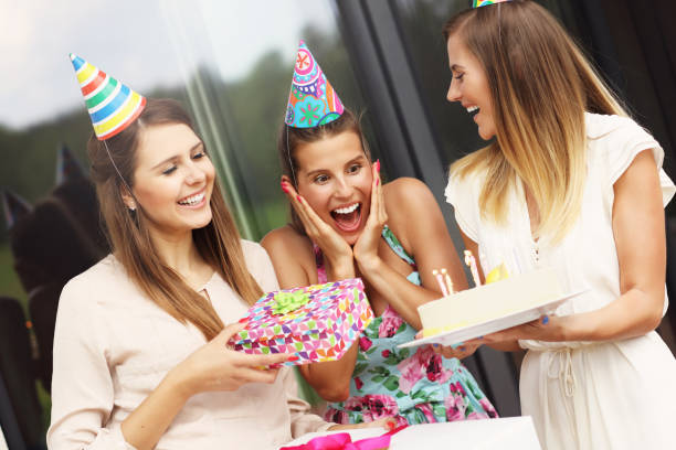 istock Group of friends celebrating birthday 584877242