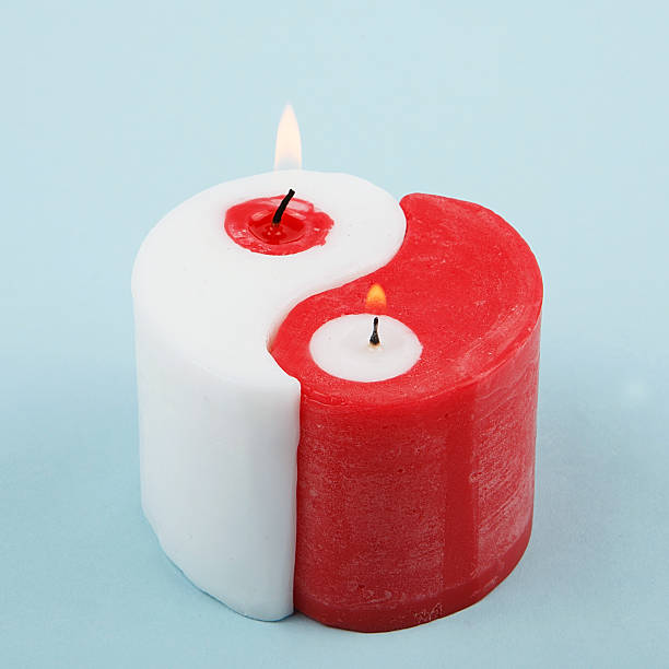 istock White and red Yin Yang handmade candle 584878404