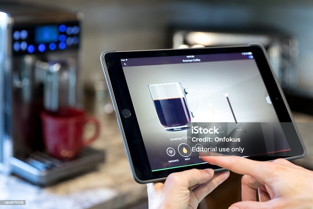 Coffee Maker Inside Smart Homes Being Controlled On Digital Tablet Stock  Photo - Download Image Now - iStock