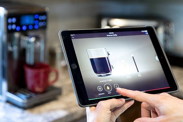 Coffee Maker Inside Smart Homes Being Controlled On Digital Tablet Stock  Photo - Download Image Now - iStock