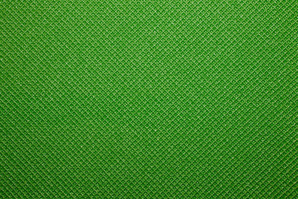 istock Green yoga mat texture background. 584879852