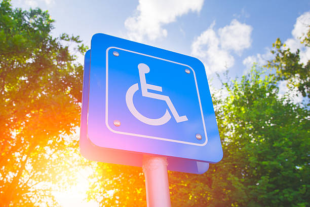 istock Parking for disability persons sign. 584883650