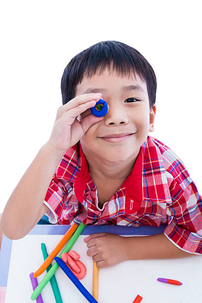 istock Child show his works from clay. 584885024