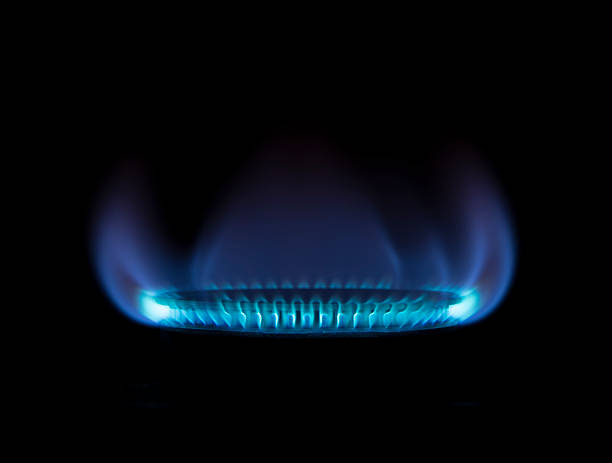 istock Burning gas stove on black background 584886480