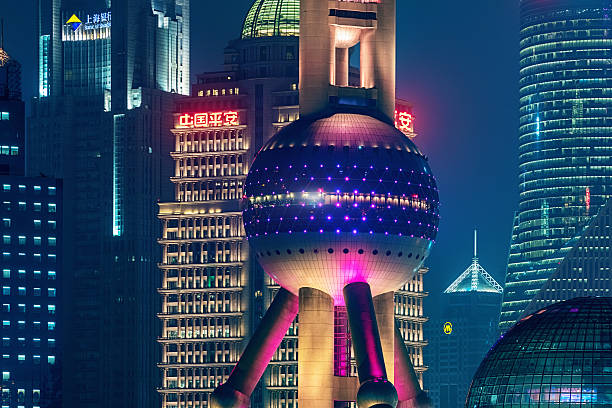istock Futuristic Shanghai Illuminated Oriental Pearl Tower 584889060