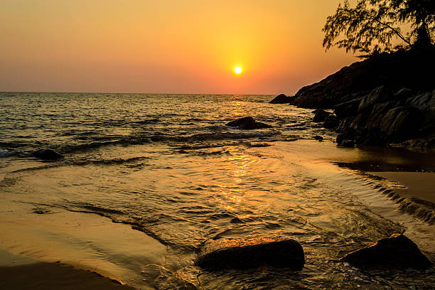 istock Beautiful Sunset on Nai Thon beach (Andaman sea) 584890242