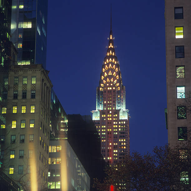 istock Buildings of Manhattan at night. 584890782